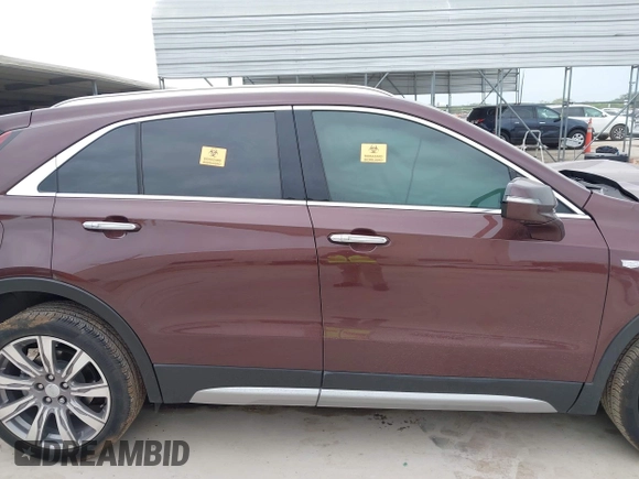 2022 Cadillac XT4 FWD Premium Luxury with VIN 1GYFZCR4XNF116845, listed as a IAAI auction lot 42128210 with 43,423 mi miles and . Bid and sale history available at DreamBid. Image 12.