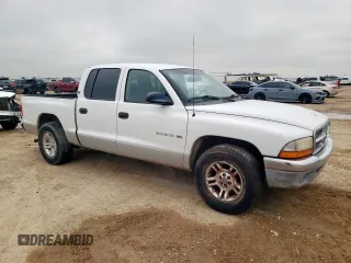 2001 Dodge Dakota Sport z VIN 1B7GL2AN51S118157, wystawiony jako Copart lot #58797325 z przebiegiem 147 765 mil mil oraz Szkoda całkowita • Salvage title. Historia ofert i sprzedaży dostępna na DreamBid. Obrazek 4.