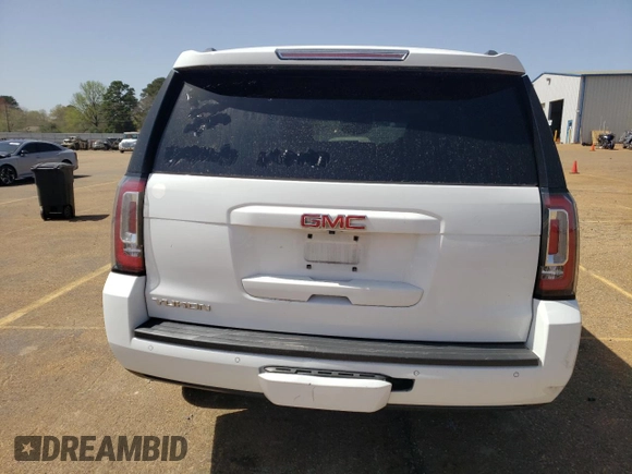 2016 GMC Yukon SLT with VIN 1GKS2BKC4GR270008, listed as a Copart auction lot 48519255 with 0 mi miles and Salvage Title. Bid and sale history available at carsss.com. Image 6.