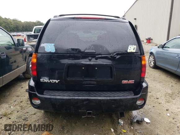 2004 GMC Envoy SLT with VIN 1GKDT13S942279670, listed as a Copart auction lot 73527974 with 120,425 mi miles and Salvage Title. Bid and sale history available at DreamBid. Image 6.