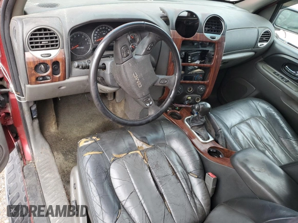 2003 GMC Envoy SLE with VIN 1GKDT13S332136423, listed as a Copart auction lot 49301635 with 148,669 mi miles and Salvage Title. Bid and sale history available at carsss.com. Image 8.