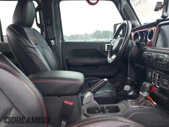 2021 Jeep Gladiator Rubicon with VIN 1C6JJTBG7ML554354, listed as a IAAI auction lot 41796943 with 61,513 mi miles and . Bid and sale history available at DreamBid. Image 5.