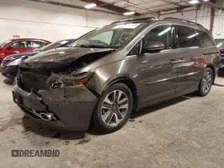 2016 Honda Odyssey Touring Elite with VIN 5FNRL5H92GB045824, listed as a IAAI auction lot 41872220 with 120,557 mi miles. Bid and sale history available at carsss.com. Image 2.