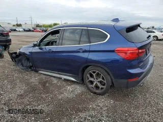 2018 BMW X1 sDrive28i with VIN WBXHU7C33J3F04439, listed as a Copart auction lot 45034033 with 28,091 mi miles. Bid and sale history available at carsss.com. Image 2.