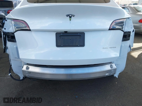 2024 Tesla Model Y Long Range with VIN 7SAYGDEE5RA222333, listed as a IAAI auction lot 41944404 with 12,176 mi miles. Bid and sale history available at carsss.com. Image 6.