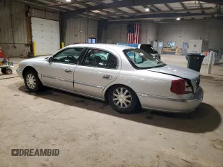 2001 Lincoln Continental with VIN 1LNHM97V51Y698794, listed as a Copart auction lot 47649315 with 84,465 mi miles and Salvage Title. Bid and sale history available at DreamBid. Image 2.