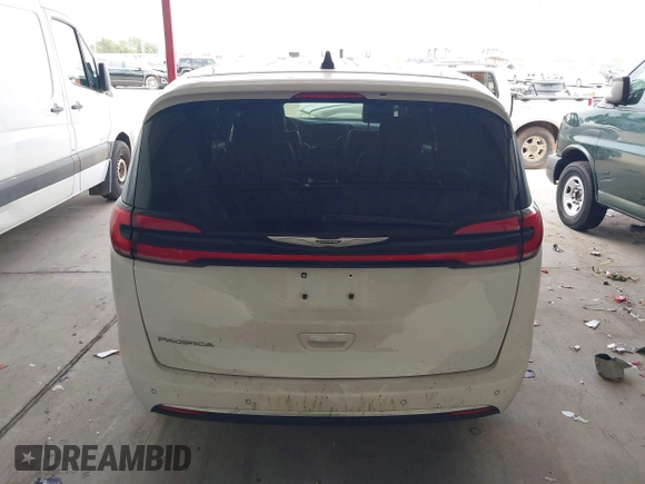2023 Chrysler Pacifica Touring L with VIN 2C4RC1BG6PR550575, listed as a IAAI auction lot 42576498 with 54,373 mi miles and . Bid and sale history available at DreamBid. Image 16.