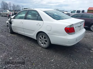 2005 Toyota Camry LE with VIN JTDBF30KX50165586, listed as a IAAI auction lot 41948322 with 84,326 mi miles and . Bid and sale history available at DreamBid. Image 3.