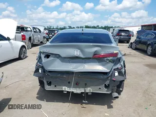 2025 Honda Civic Sport with VIN 2HGFE2F54SH564003, listed as a IAAI auction lot 42123436 with 7,042 mi miles and . Bid and sale history available at DreamBid. Image 6.