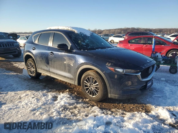 2021 Mazda CX-5 Touring with VIN JM3KFACM2M0329646, listed as a Copart auction lot 88217245 with 46,864 mi miles and Salvage Title. Bid and sale history available at carsss.com. Image 4.