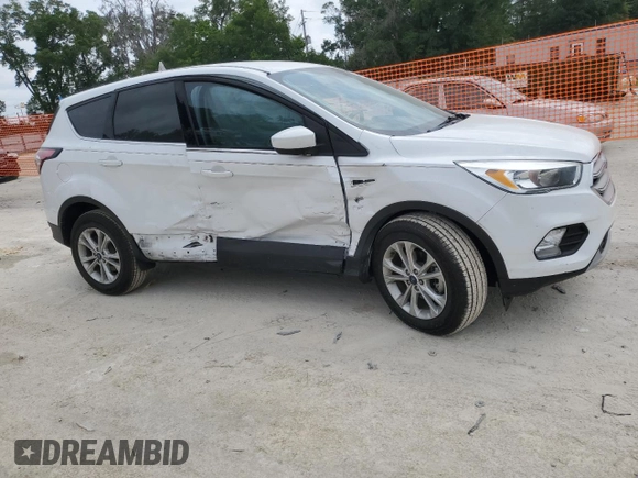 2017 Ford Escape SE with VIN 1FMCU0GD9HUE00634, listed as a Copart auction lot 53939945 with 102,109 mi miles and Salvage Title. Bid and sale history available at DreamBid. Image 4.
