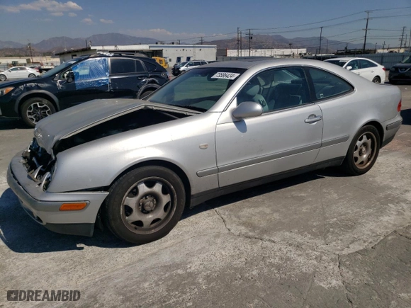 1999 Mercedes-Benz CLK-Class with VIN WDBLJ65G9XF065356, listed as a Copart auction lot 73586424 with 228,410 mi miles and Salvage Title. Bid and sale history available at carsss.com. Image 1.