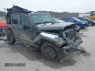 2023 Jeep Wrangler Willys with VIN 1C4HJXDN1PW596046, listed as a IAAI auction lot 41580875 with 48,451 mi miles and . Bid and sale history available at DreamBid. Image 1.