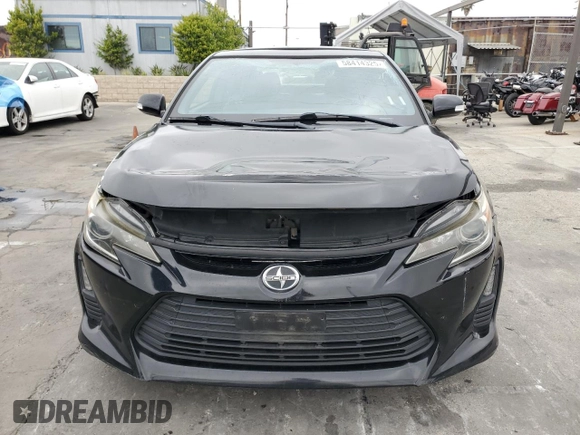 2015 Scion tC z VIN JTKJF5C75F3093123, wystawiony jako Copart lot #58414325 z przebiegiem 107 051 mil mil oraz Szkoda całkowita • Salvage title. Historia ofert i sprzedaży dostępna na DreamBid. Obrazek 5.