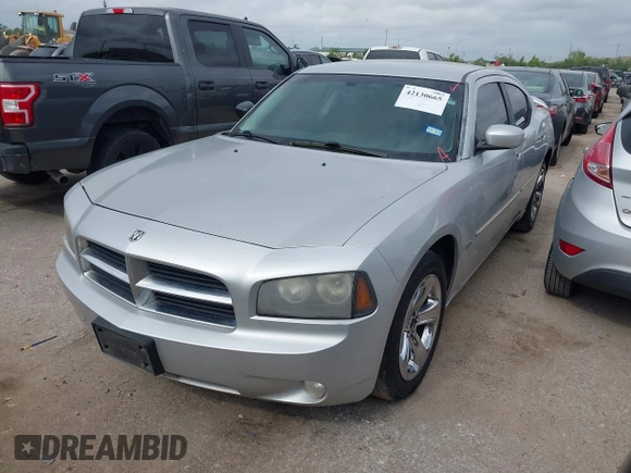 2010 Dodge Charger SXT with VIN 2B3CA3CV7AH292957, listed as a IAAI auction lot 42130665 with 253,598 mi miles and . Bid and sale history available at DreamBid. Image 2.