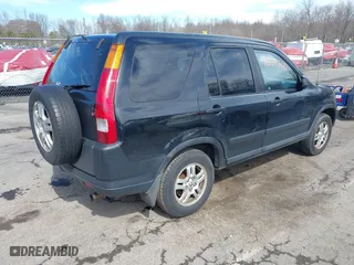 2003 Honda CR-V EX with VIN SHSRD78833U137690, listed as a IAAI auction lot 41831360 with 208,795 mi miles. Bid and sale history available at carsss.com. Image 4.