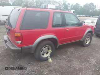 1999 Ford Explorer Sport z VIN 1FMYU24X5XUA19152, wystawiony jako IAAI lot #42473945 z przebiegiem Nie podano mil oraz . Historia ofert i sprzedaży dostępna na DreamBid. Obrazek 4.