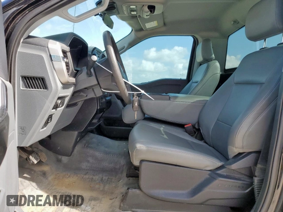 2022 Ford F-150 XL with VIN 1FTMF1C59NKF26135, listed as a Copart auction lot 60034745 with 57,430 mi miles and Salvage title. Bid and sale history available at DreamBid. Image 7.