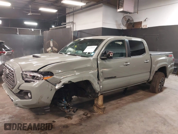 2023 Toyota Tacoma 4WD SR with VIN 3TMCZ5ANXPM607489, listed as a IAAI auction lot 41605018 with 15,229 mi miles. Bid and sale history available at carsss.com. Image 6.