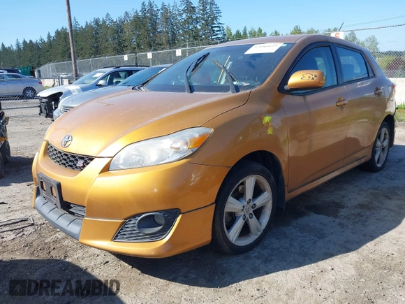 2009 Toyota Matrix S with VIN 2T1LE40E89C009775, listed as a IAAI auction lot 42086039 with 220,832 mi miles. Bid and sale history available at carsss.com. Image 2.