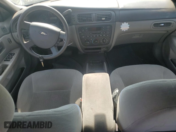 2004 Ford Taurus SE with VIN 1FAFP53U04G133586, listed as a Copart auction lot 59972925 with 228,938 mi miles and Salvage title. Bid and sale history available at DreamBid. Image 8.