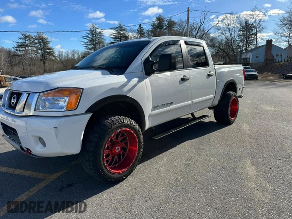 2015 Nissan Titan SL with VIN 1N6BA0EC7FN509763, listed as a Copart auction lot 88064785 with 168,916 mi miles and Clean Title. Bid and sale history available at carsss.com. Image 1.