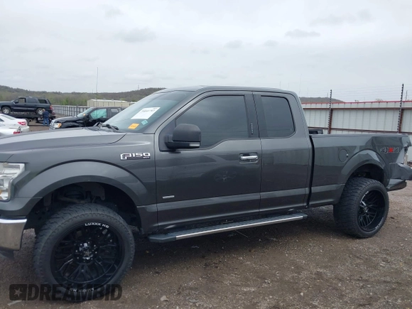 2015 Ford F-150 XLT with VIN 1FTEX1EP9FFC75210, listed as a IAAI auction lot 39041797 with 125,522 mi miles. Bid and sale history available at carsss.com. Image 15.