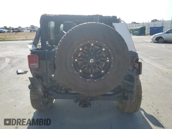 2012 Jeep Wrangler Unlimited Sahara with VIN 1C4BJWEG5CL235835, listed as a Copart auction lot 60673555 with 86,606 mi miles and Salvage title. Bid and sale history available at DreamBid. Image 6.
