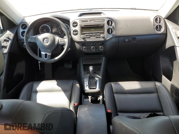 2014 Volkswagen Tiguan SEL with VIN WVGAV3AX8EW585929, listed as a Copart auction lot 61462205 with 63,899 mi miles and Salvage title. Bid and sale history available at DreamBid. Image 8.