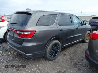 2016 Dodge Durango R/T with VIN 1C4SDJCT5GC440801, listed as a IAAI auction lot 42167132 with 151,016 mi miles and . Bid and sale history available at DreamBid. Image 4.