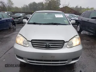 2004 Toyota Corolla CE with VIN JTDBR38E642035944, listed as a IAAI auction lot 42173263 with 119,302 mi miles. Bid and sale history available at carsss.com. Image 6.