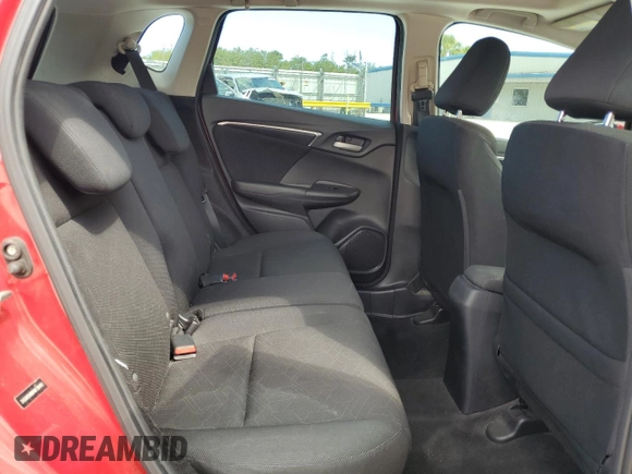 2015 Honda Fit EX-L z VIN 3HGGK5H88FM738491, wystawiony jako Copart lot #56782435 z przebiegiem 94 727 mil mil oraz Szkoda całkowita • Salvage title. Historia ofert i sprzedaży dostępna na DreamBid. Obrazek 10.
