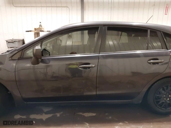 2013 Subaru Impreza Wagon 2.0i with VIN JF1GPAA60DH815623, listed as a IAAI auction lot 41738351 with 57,935 mi miles. Bid and sale history available at carsss.com. Image 15.