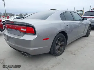 2014 Dodge Charger SXT with VIN 2C3CDXHG6EH239314, listed as a IAAI auction lot 41683245 with 194,180 mi miles. Bid and sale history available at carsss.com. Image 4.