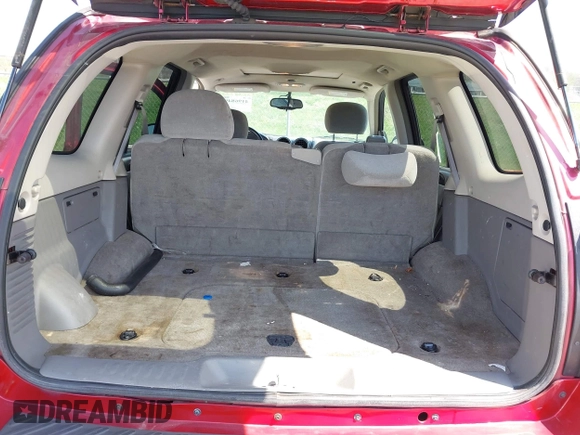 2005 GMC Envoy SLT with VIN 1GKDS13SX52144959, listed as a IAAI auction lot 41968495 with 238,199 mi miles. Bid and sale history available at carsss.com. Image 17.
