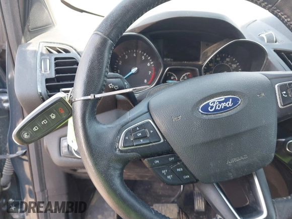 2019 Ford Escape Titanium with VIN 1FMCU9J99KUC00935, listed as a IAAI auction lot 42583250 with 91,241 mi miles and . Bid and sale history available at DreamBid. Image 11.