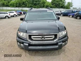 2010 Honda Ridgeline RTL with VIN 5FPYK1F5XAB014004, listed as a Copart auction lot 62848595 with 131,920 mi miles and Clean title. Bid and sale history available at DreamBid. Image 13.