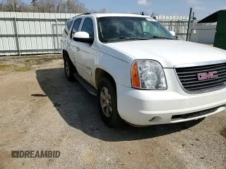 2011 GMC Yukon SLE with VIN 1GKS1AE09BR271002, listed as a Copart auction lot 49349275 with 245,183 mi miles and Salvage Title. Bid and sale history available at carsss.com. Image 12.