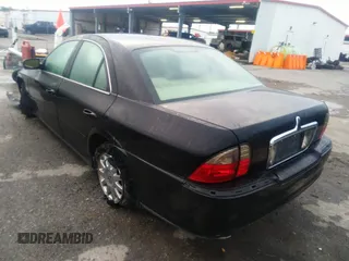 2005 Lincoln LS w/Luxury Pkg with VIN 1LNHM86S85Y606813, listed as a IAAI auction lot 39938974 with 131,558 mi miles. Bid and sale history available at carsss.com. Image 3.