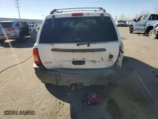 2002 Jeep Grand Cherokee Laredo with VIN 1J4GW48S72C298133, listed as a Copart auction lot 43973315 with 266,437 mi miles and Salvage Title. Bid and sale history available at carsss.com. Image 6.