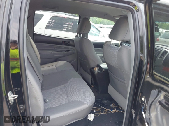 2013 Toyota Tacoma with VIN 3TMLU4EN4DM117239, listed as a IAAI auction lot 42494359 with 239,635 mi miles and . Bid and sale history available at DreamBid. Image 8.