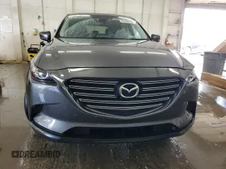 2017 Mazda CX-9 Touring with VIN JM3TCBCY5H0134295, listed as a Copart auction lot 63448185 with 174,248 mi miles and Salvage title. Bid and sale history available at DreamBid. Image 5.