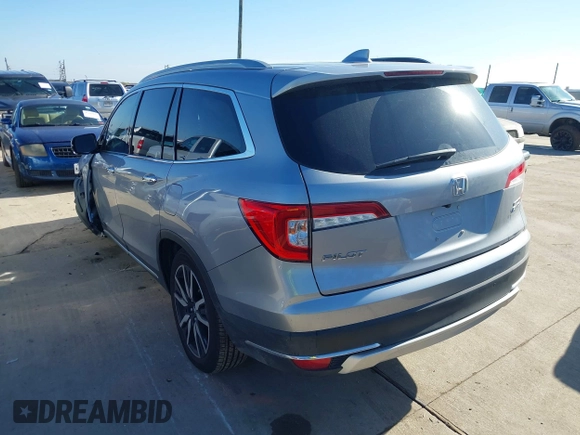 2020 Honda Pilot Touring 8-Passenger with VIN 5FNYF6H95LB021455, listed as a IAAI auction lot 41187609 with 35,589 mi miles and . Bid and sale history available at DreamBid. Image 3.
