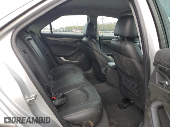 2013 Cadillac CTS Luxury with VIN 1G6DE5E5XD0137864, listed as a Copart auction lot 50077885 with 112,471 mi miles and Salvage title. Bid and sale history available at DreamBid. Image 10.
