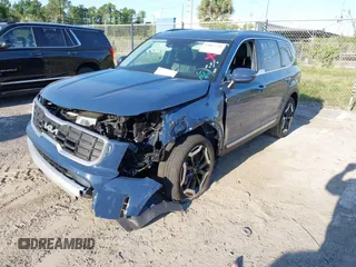 2025 Kia Telluride S with VIN 5XYP64GCXSG587826, listed as a IAAI auction lot 42065749 with 1,864 mi miles and . Bid and sale history available at DreamBid. Image 17.