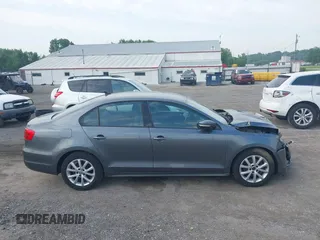 2011 Volkswagen Jetta SE with VIN 3VWDX7AJ5BM388532, listed as a IAAI auction lot 42453112 with 120,170 mi miles and . Bid and sale history available at DreamBid. Image 13.