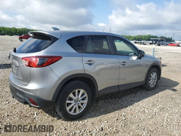 2014 Mazda CX-5 Touring z VIN JM3KE2CY0E0412733, wystawiony jako Copart lot #55803865 z przebiegiem 161 539 mil mil oraz Szkoda całkowita • Salvage title. Historia ofert i sprzedaży dostępna na DreamBid. Obrazek 3.