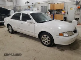 2000 Mazda 626 LX with VIN 1YVGF22C1Y5164480, listed as a Copart auction lot 42545885 with 152,489 mi miles and Clean Title. Bid and sale history available at carsss.com. Image 4.