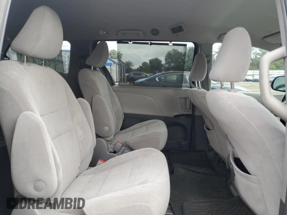 2019 Toyota Sienna LE with VIN 5TDJZ3DC6KS220467, listed as a Copart auction lot 71921714 with 70,950 mi miles and Salvage Title. Bid and sale history available at carsss.com. Image 11.