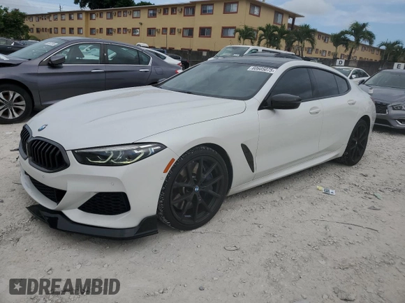 2020 BMW 8 Series M850i with VIN WBAGV8C00LCD38284, listed as a Copart auction lot 60605075 with 57,161 mi miles and Salvage title. Bid and sale history available at DreamBid. Image 1.